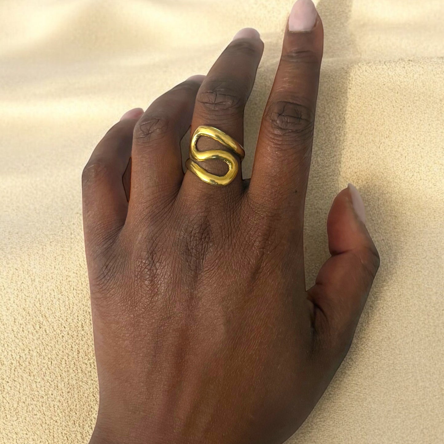 Domi - Handmade African brass curled ring